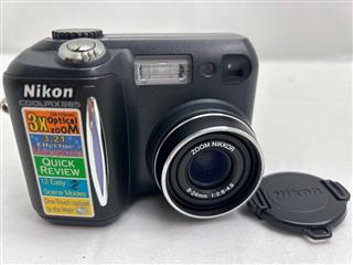 Nikon Coolpix 885 w/ Nikkor Zoom 8-24mm 3X optical zoom f/2.8-4.9